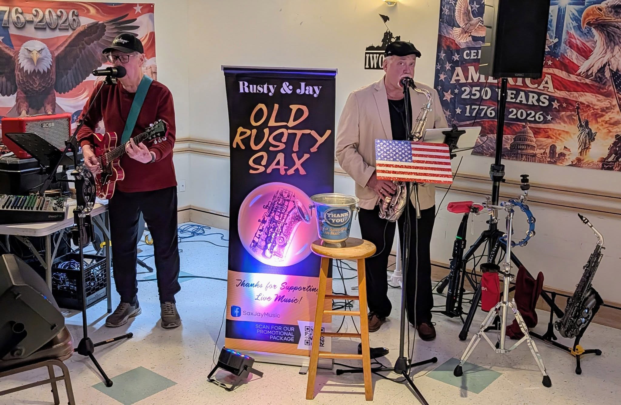 Rusty and Jay performing at Post 109 with Old Rusty Sax banner